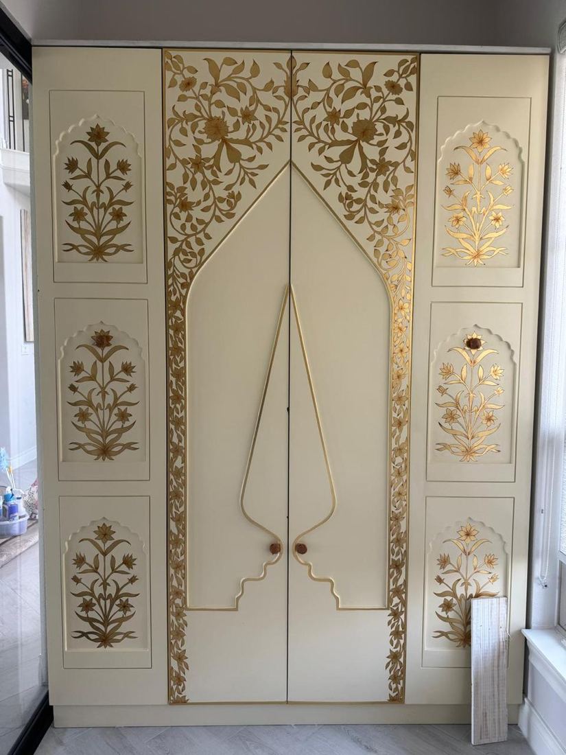 Cabinet doors with gold leaf floral work